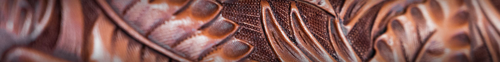 Image of hand-tooled leather saddle