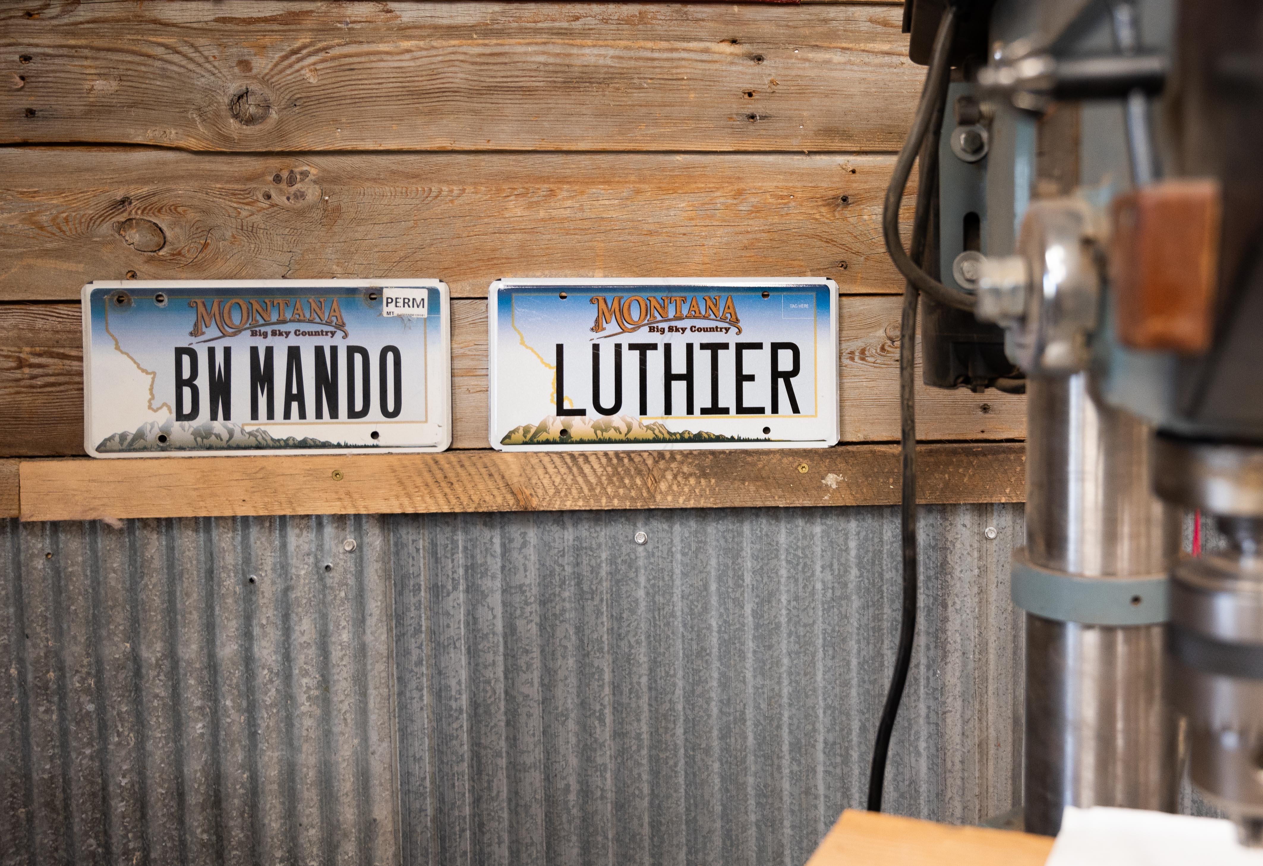Custom license plates on shop wall